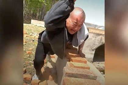 Мастер кунг-фу разбил 122 кирпича голыми руками и попал на видео